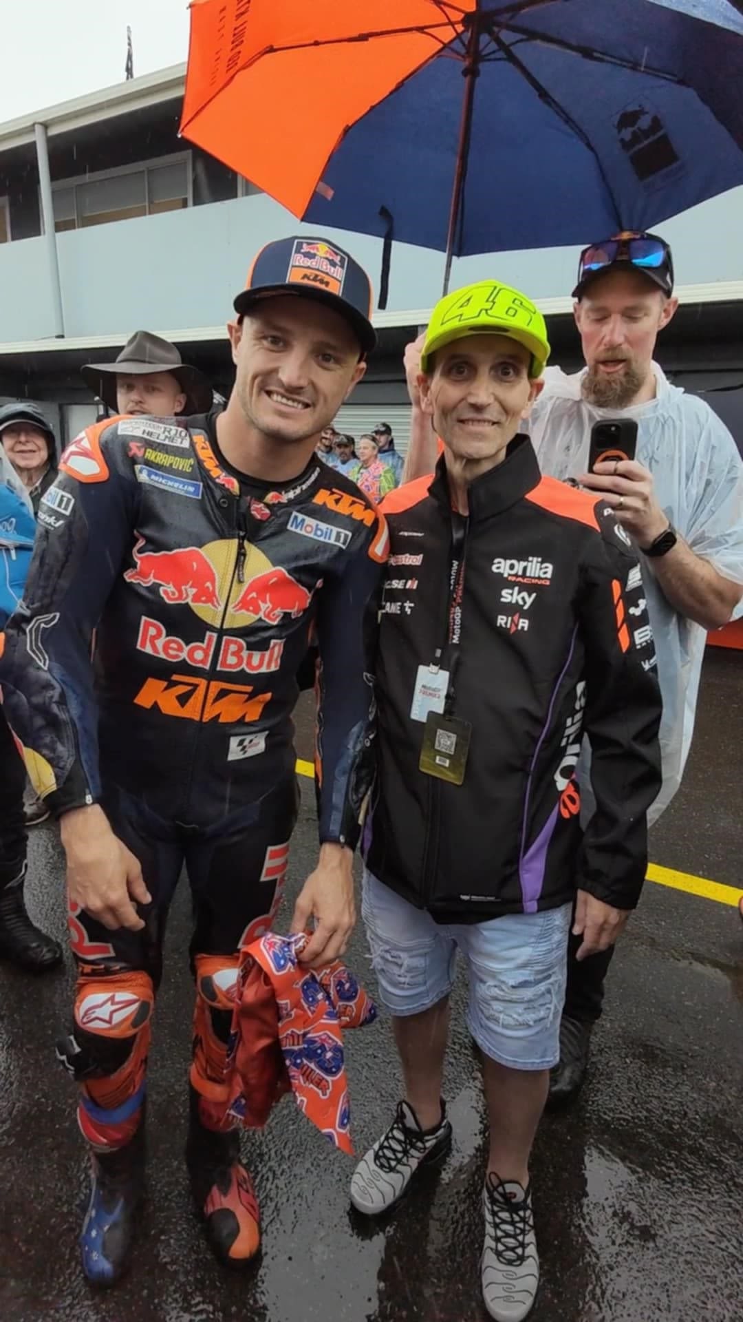 Man with cap meets Moto GP rider Jack Miller